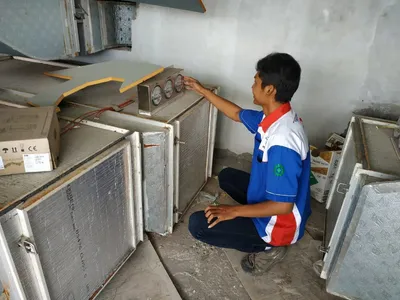 Proses cuci AC